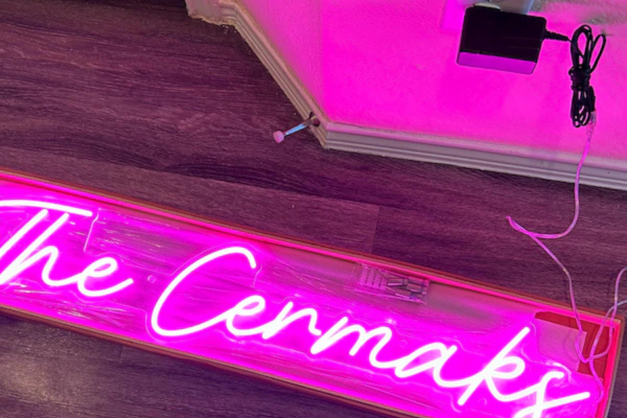 Pink custom family name neon sign